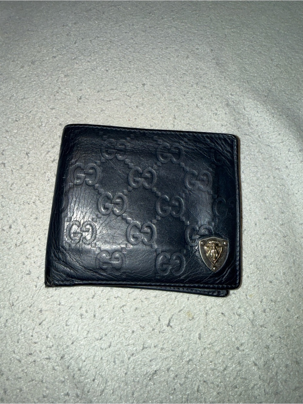 Gucci Black Embossed GG Leather Wallet with Metal Crest